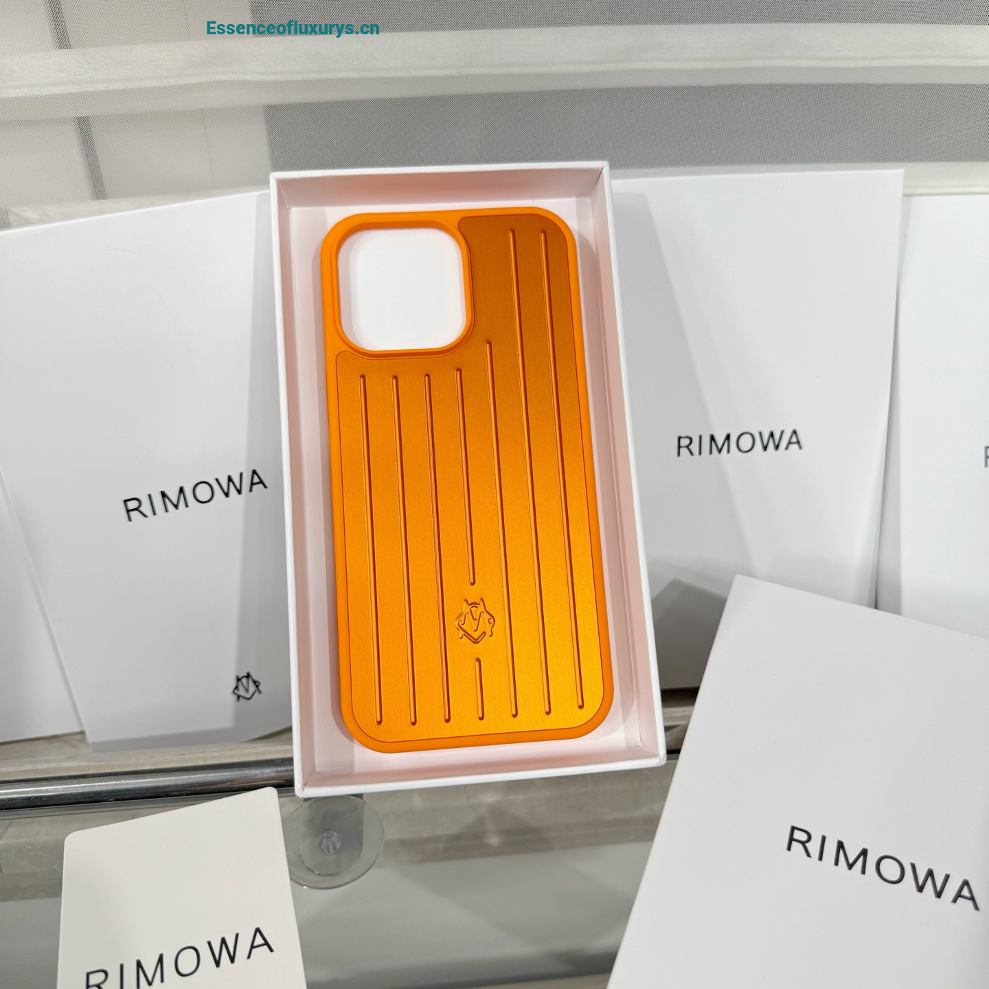 Rimowa Plastic iPhone 16 Case Orange